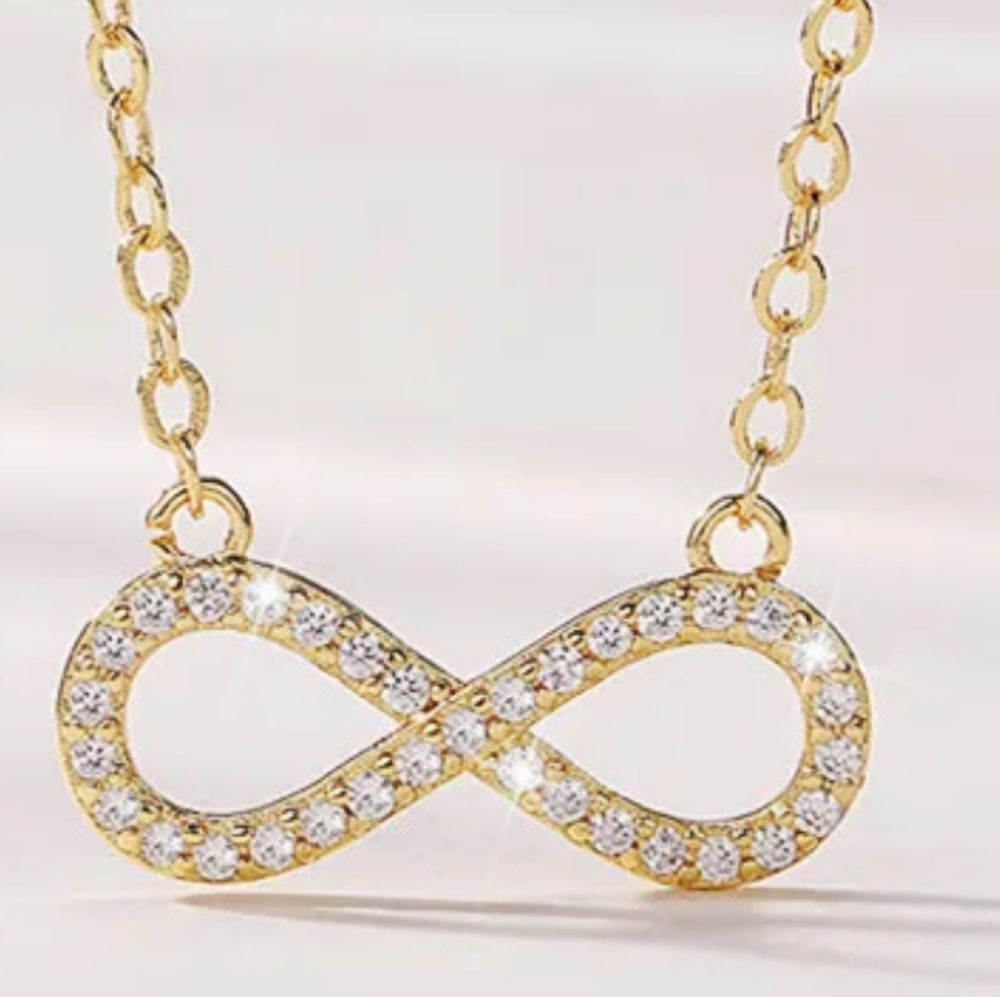 GOLD/ STERLING FIGURE 8 NECKLACE WITH WHITE TOPAZ 22-IN CHAIN ADJUSTABLE
